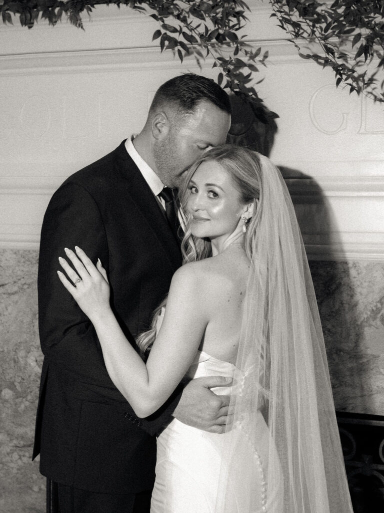 Flash photo of a bride and groom during their Cascade Hills Country Club wedding in Grand Rapids, Michigan