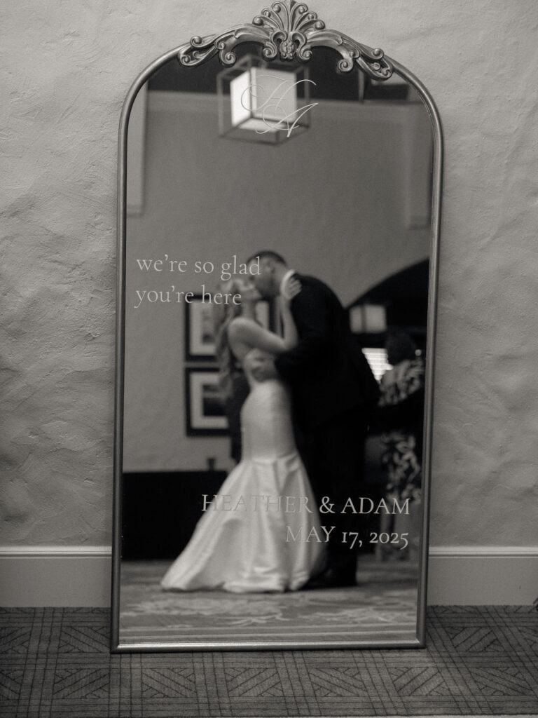 Bride and groom kissing during their Cascade Hills Country Club wedding reception in Grand Rapids, Michigan