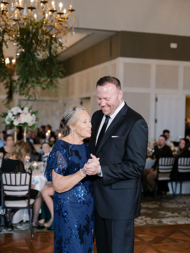 Groom dancing with his mother