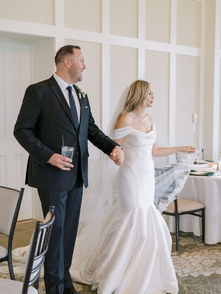 Bride and grooms wedding reception room reveal