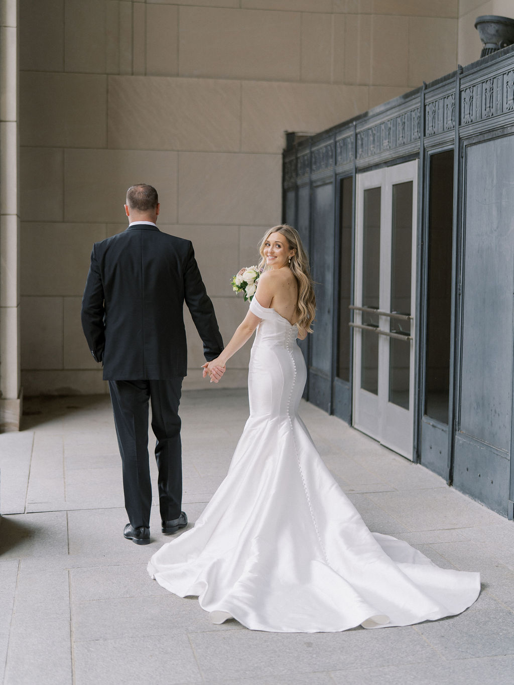 Bride and grooms portraits at the Civic Auditorium in downtown Grand Rapids.