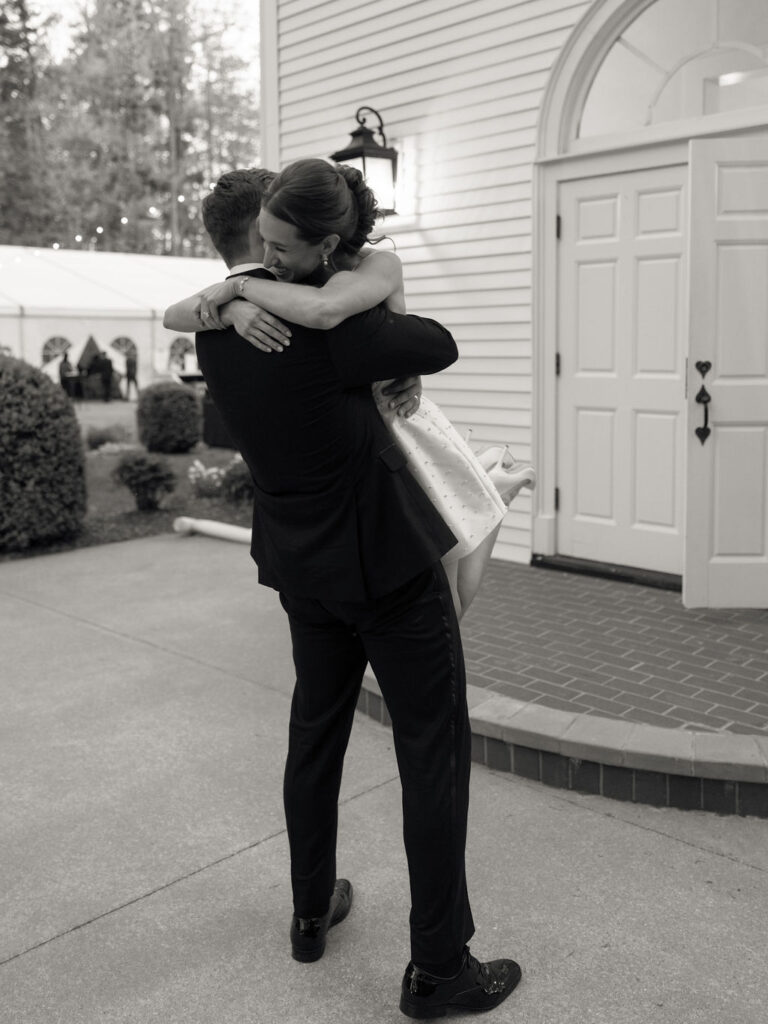 Bride and groom hugging