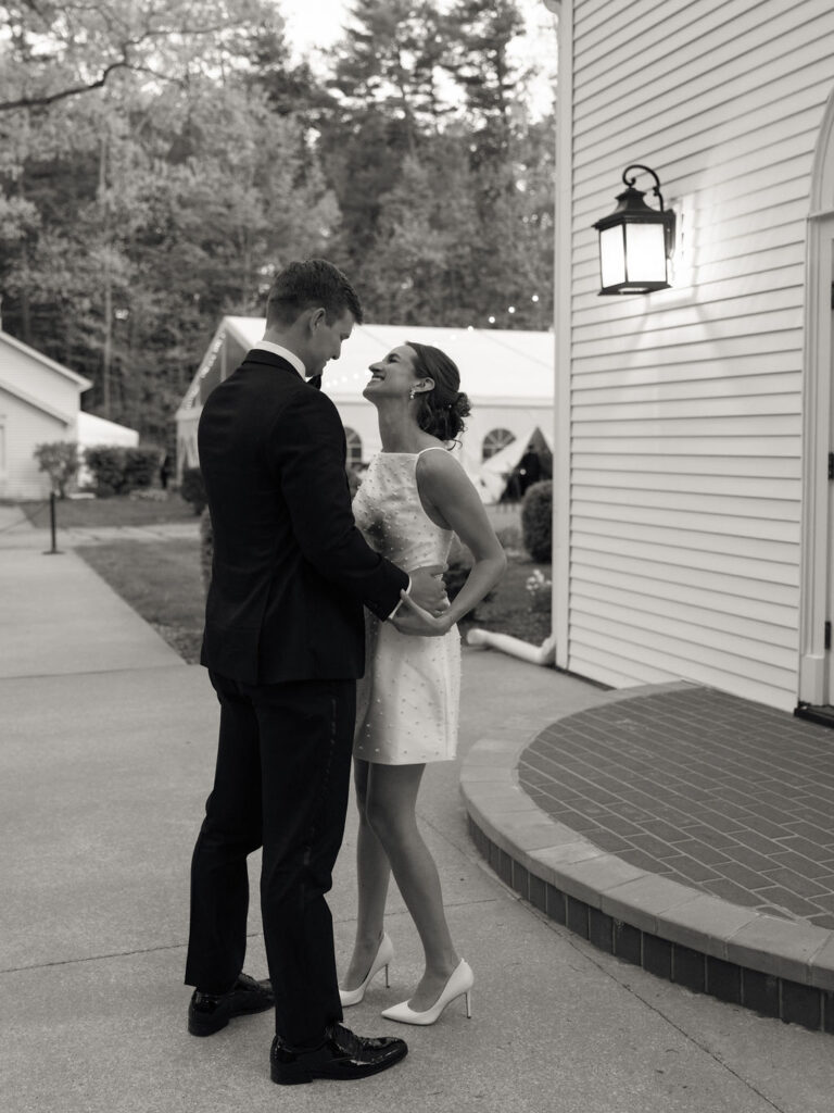 Bride and groom embracing each other at The Morris Estate 