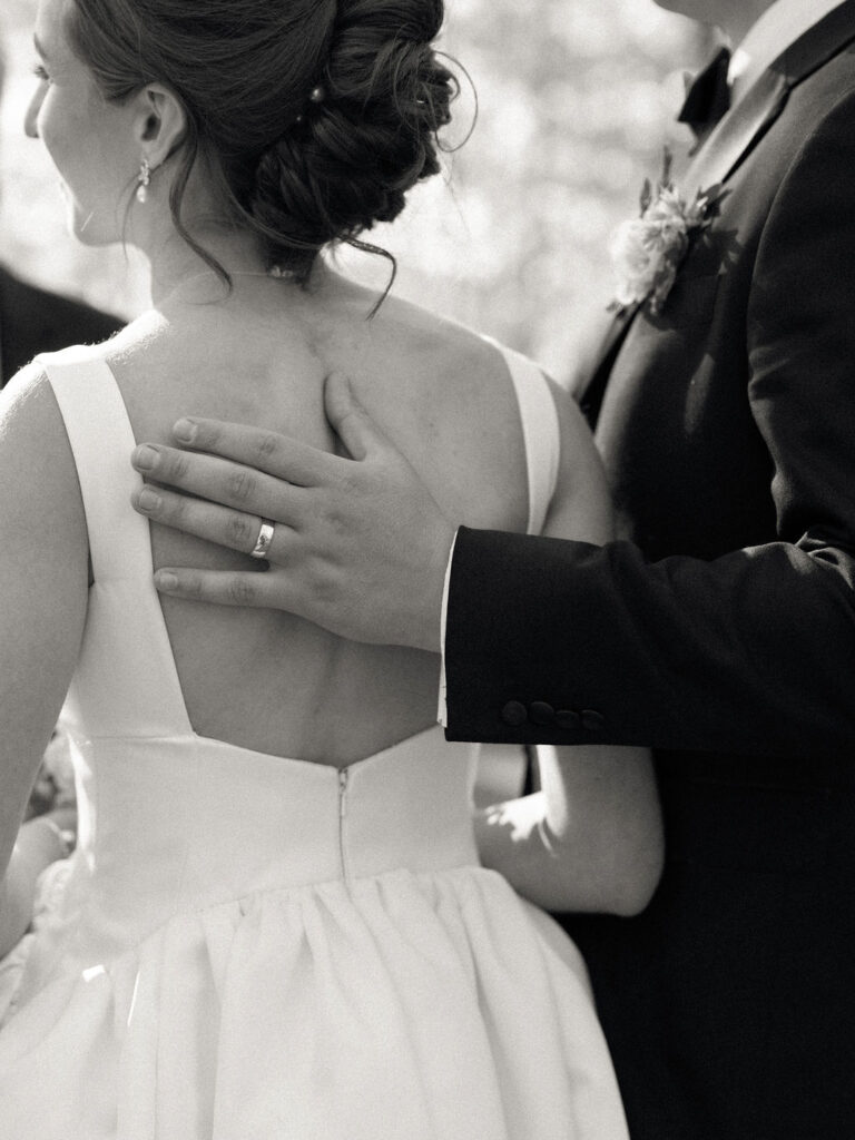 Bride and groom mingling with guests during cocktail hour