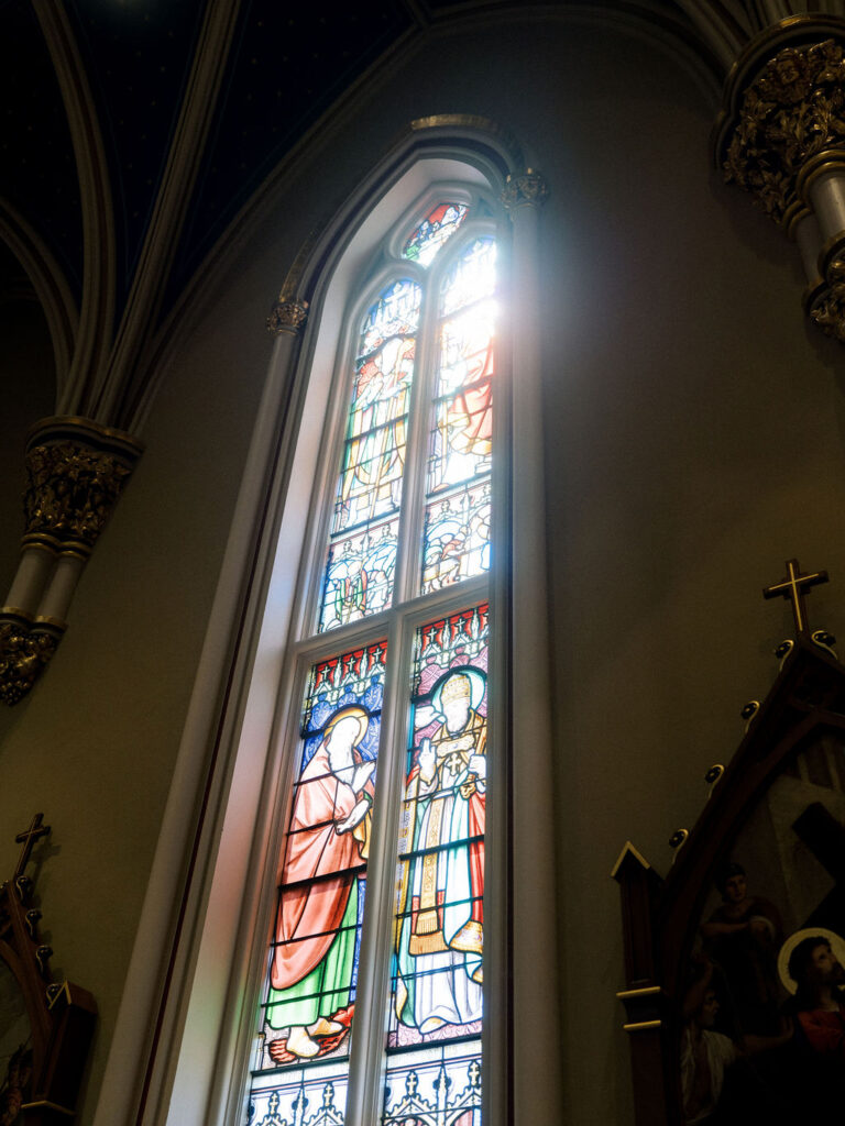 Stained glass windows inside Notre Dame Basilica