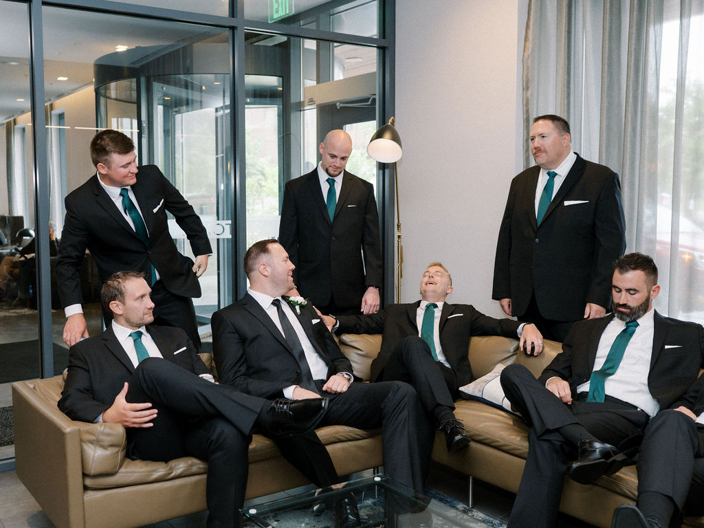 Indoor groom and groomsmen portraits