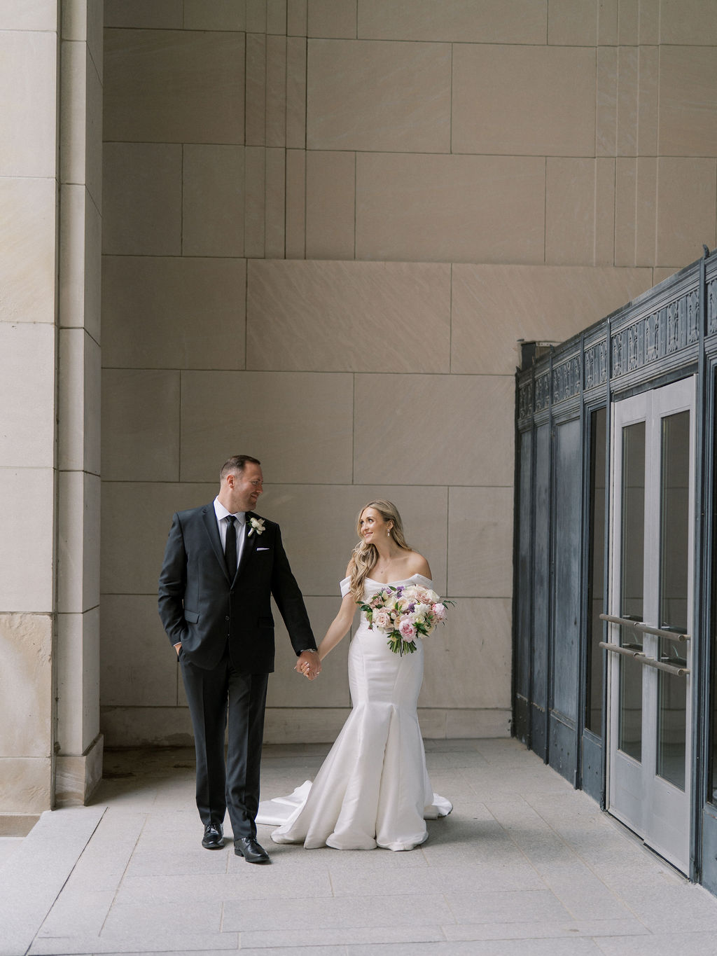 Bride and grooms portraits at the Civic Auditorium in downtown Grand Rapids.