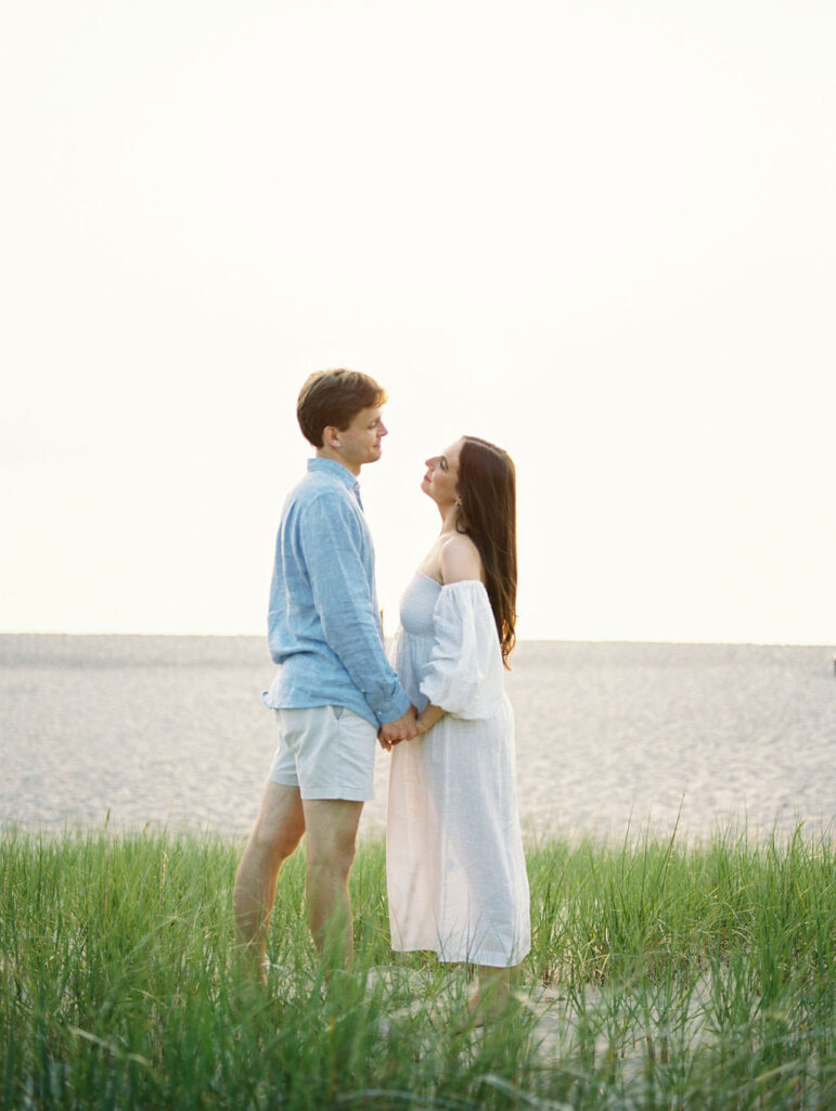 Couple posing in the beach grass