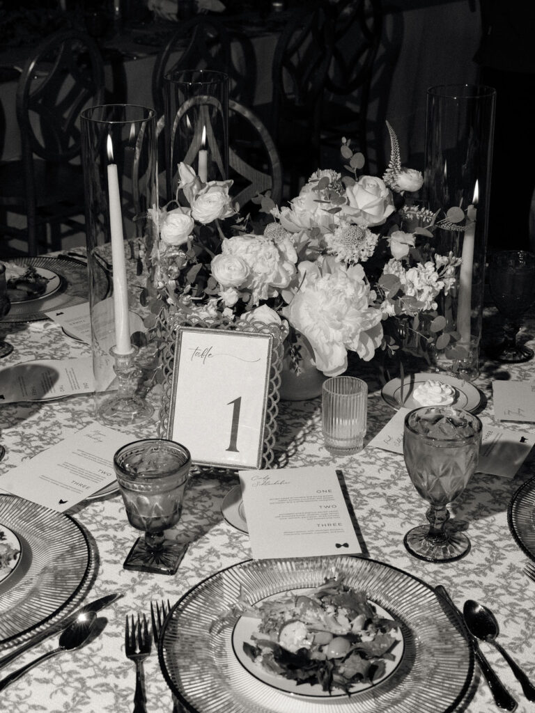 Flash black and white photo of wedding reception details at The Millhaven