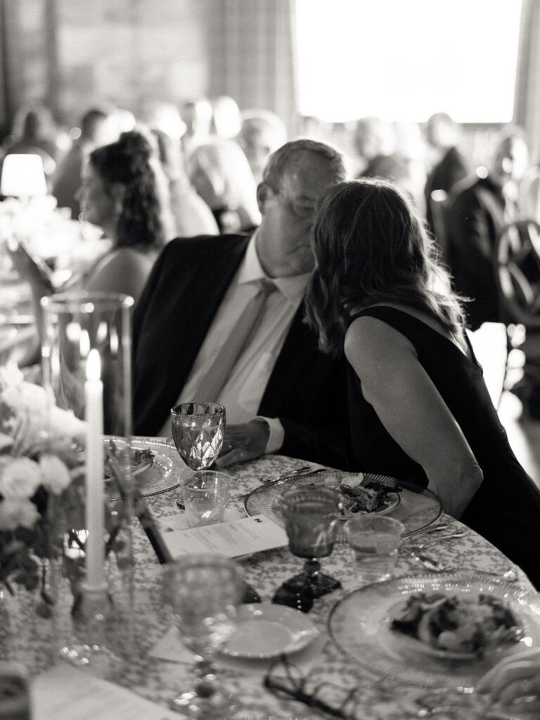 Black and white photo of guests during the reception 