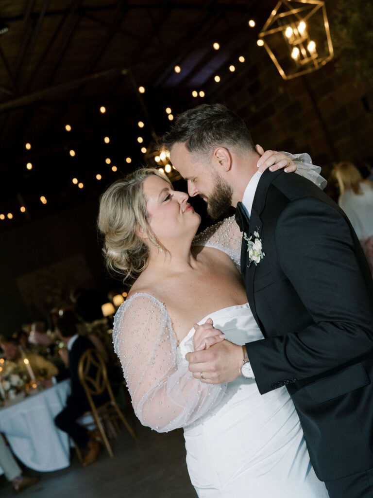 Bride and groom sharing a first dance in The Pickle Factory at The Millhaven