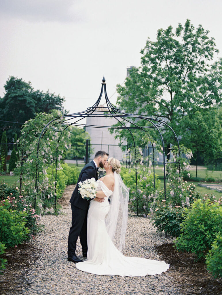 Outdoor bride and grooms portraits in the gardens at The Millhaven