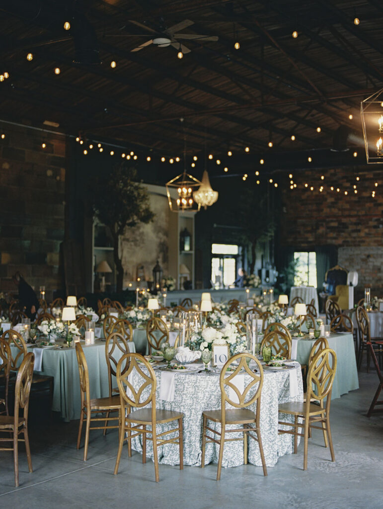 An indoor wedding reception in the Pickle Factory at The Millhaven