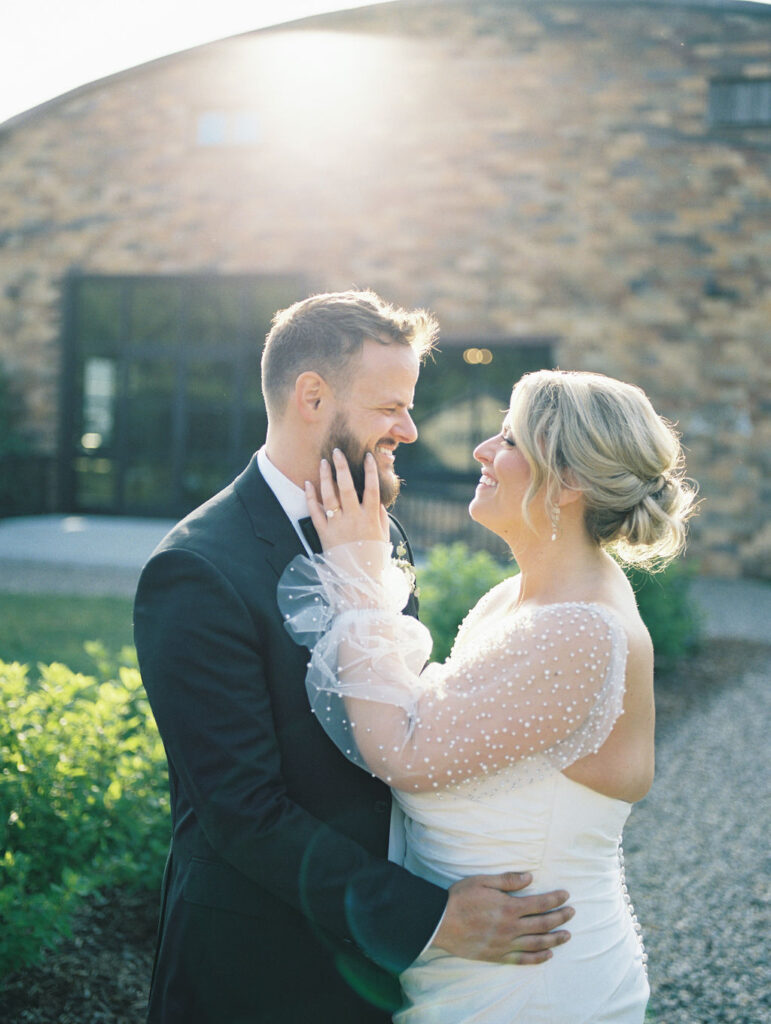 Outdoor golden hour bride and grooms portraits in the garden at The Millhaven in Marshall, Michigan on film