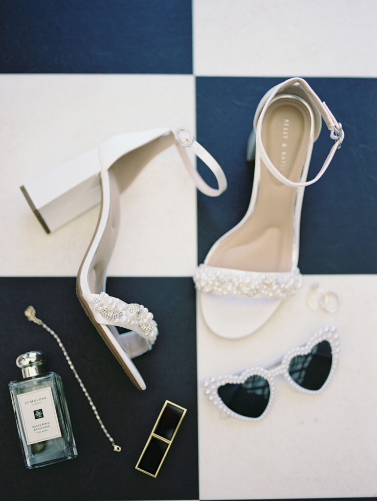 Michigan wedding detail flatlay on film from a summer wedding at The Millhaven