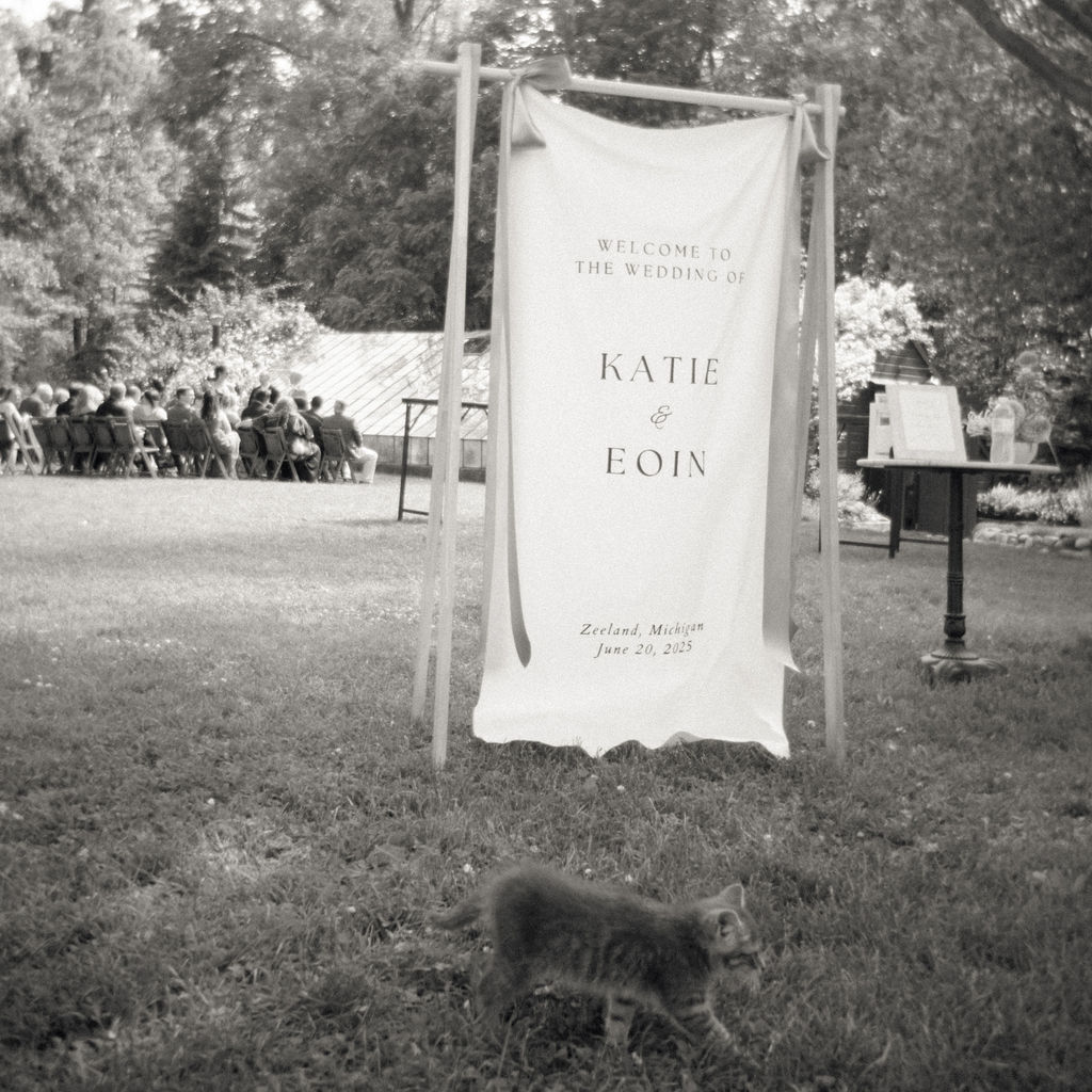 Wedding welcome sign for Katie and Eoin with a cat in the foreground.