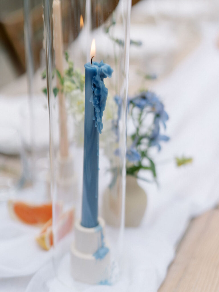 Blue tapestry candle from a Michigan wedding reception