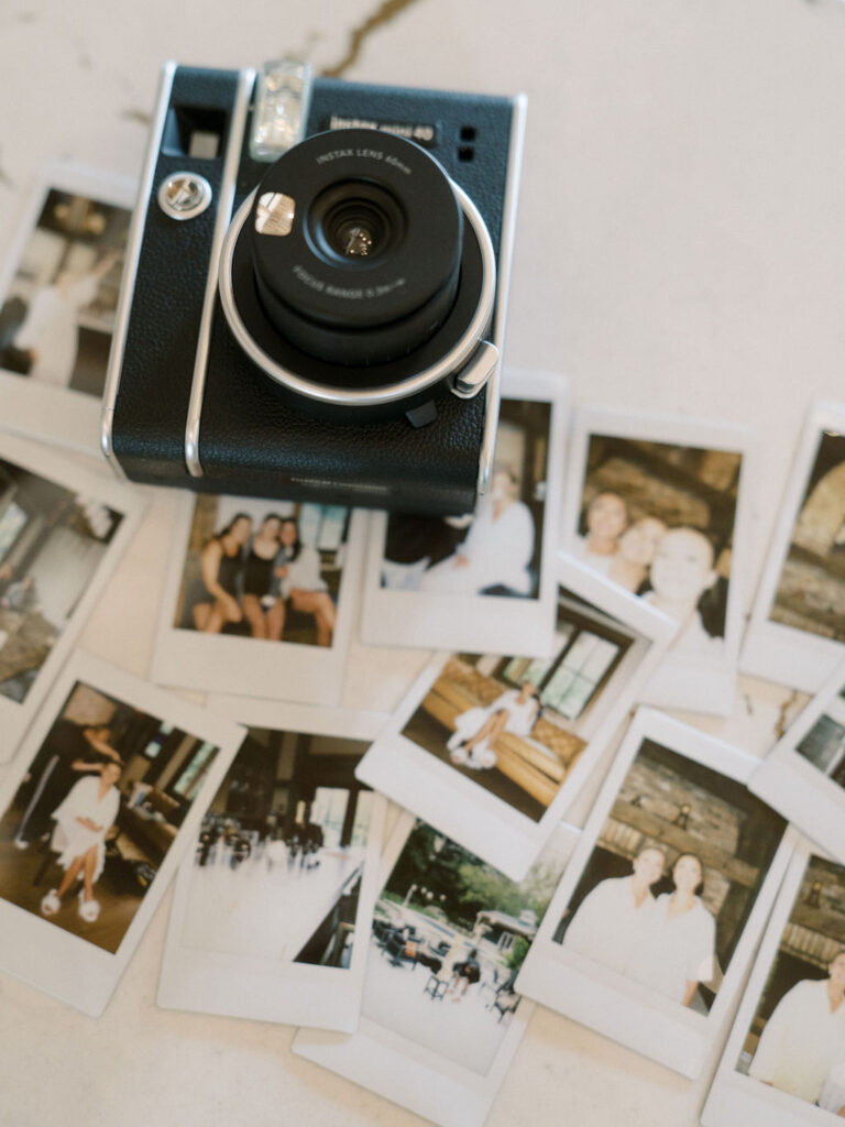 Film photos and film camera with photos showcasing wedding details and the bride and her bridesmaids getting ready