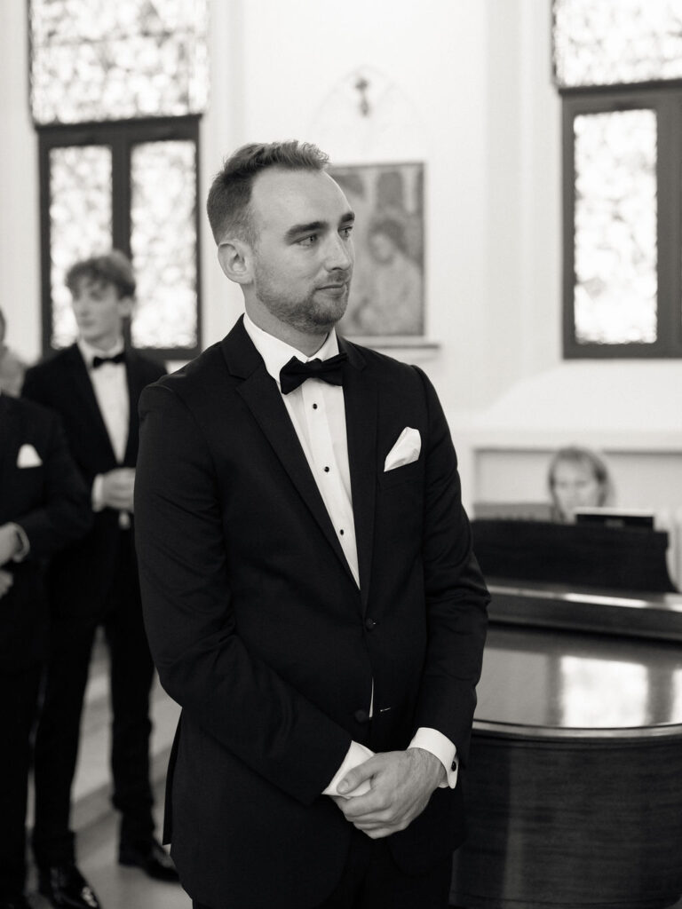 Groom waiting at the altar inside Church of Our Lady of Loretto at Saint Mary’s College – Cynthia Mae Photo.
