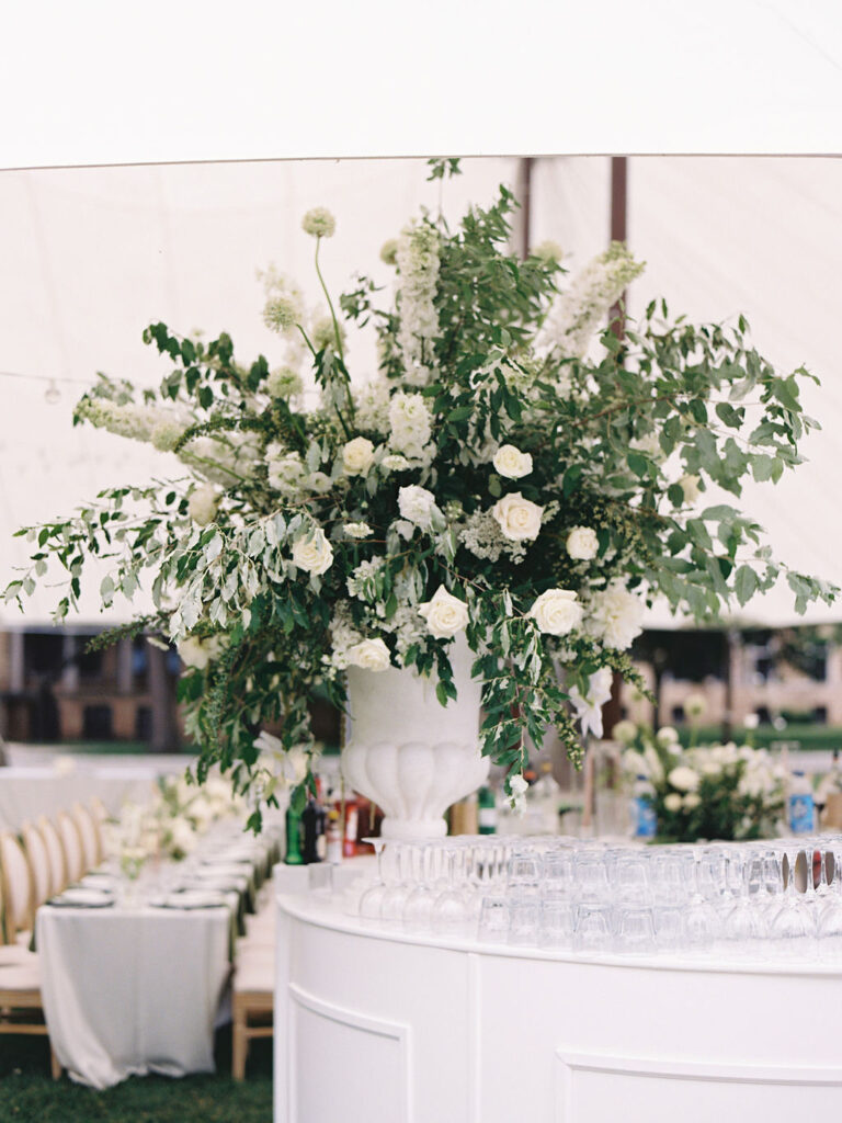Film photo of an open bar from a tended summer wedding reception