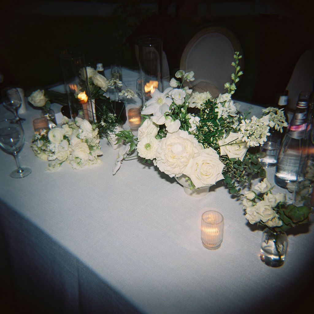Late night film photo of a wedding reception table