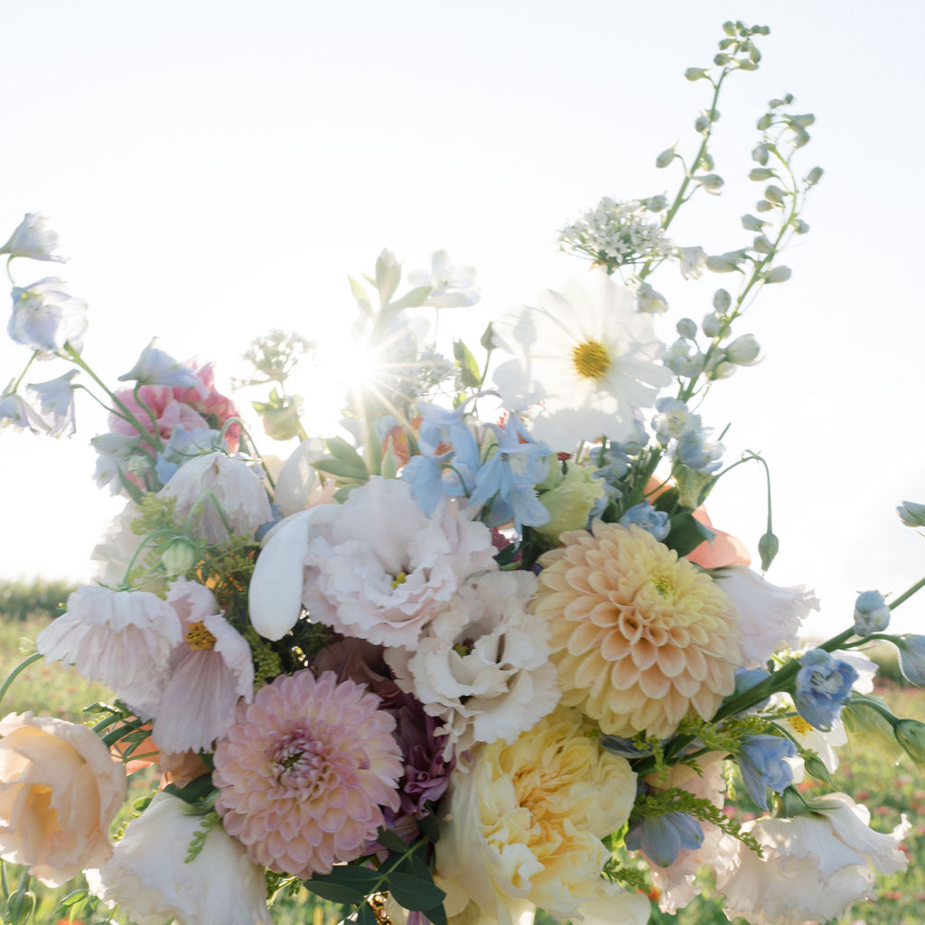 Close up shot of the brides colorful floral bouquet