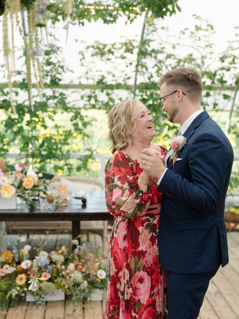 Groom sharing a dance with his mother.
