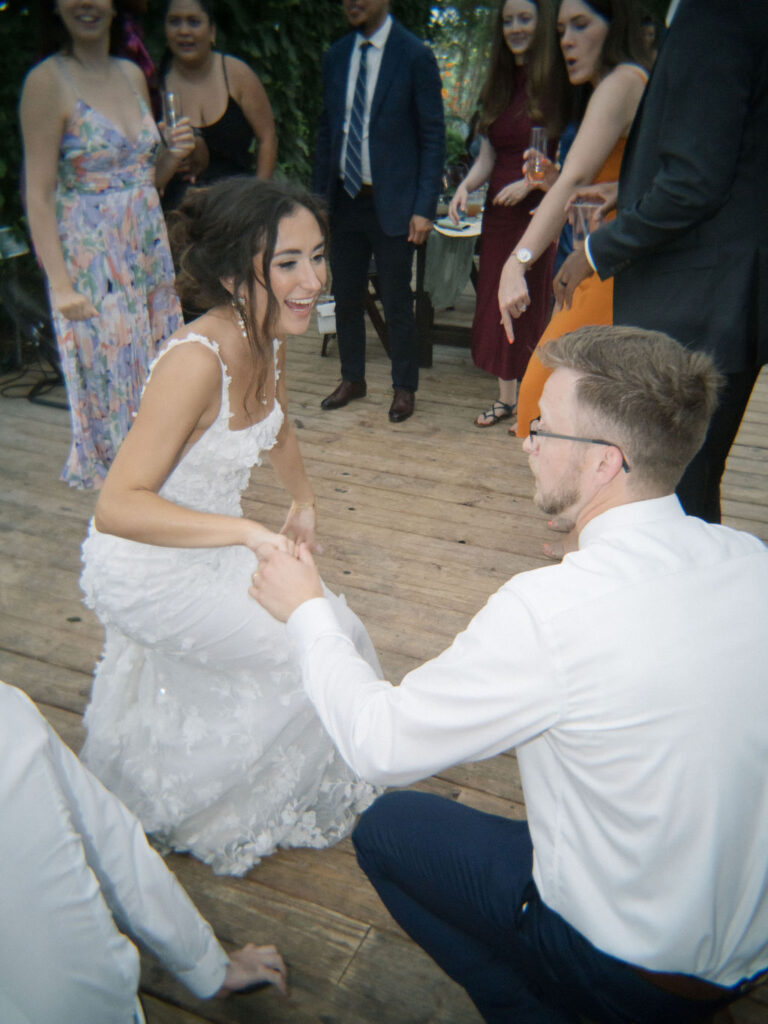 Bride and groom dancing during their Of The Land wedding reception in Michigan. 