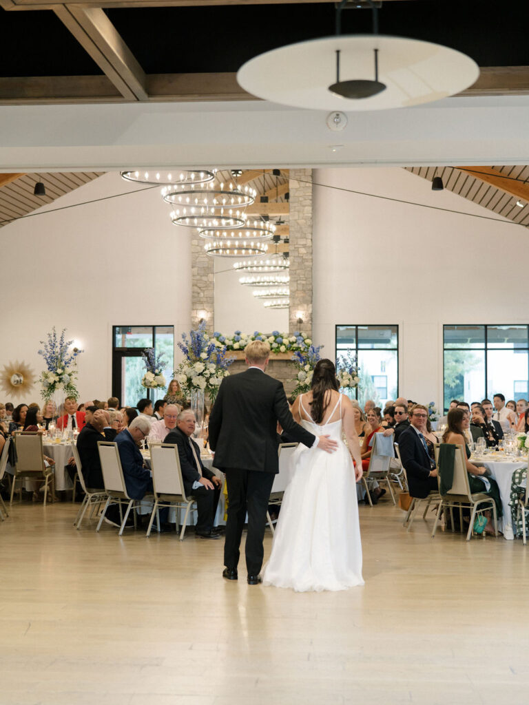 Bride and groom giving a speech during their Bay Pointe Woods wedding reception.