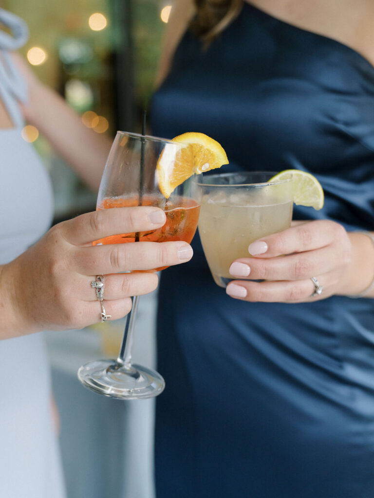 Guests enjoying cocktails during their Bay Pointe Woods wedding in Michigan.